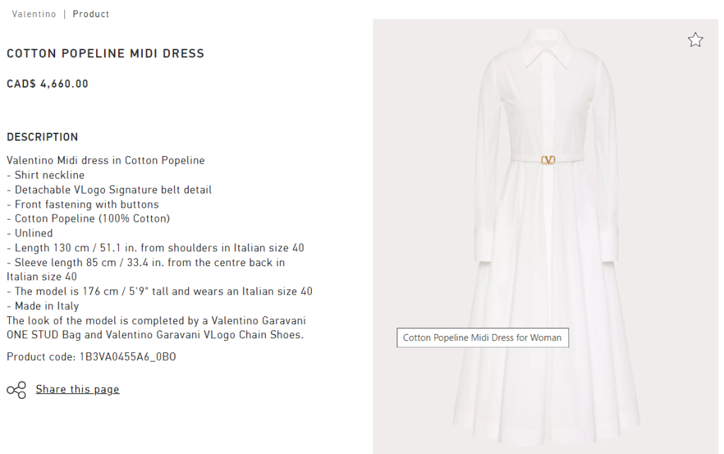 An elegant white dress by Valentino, made of cotton popeline, displayed on a website page